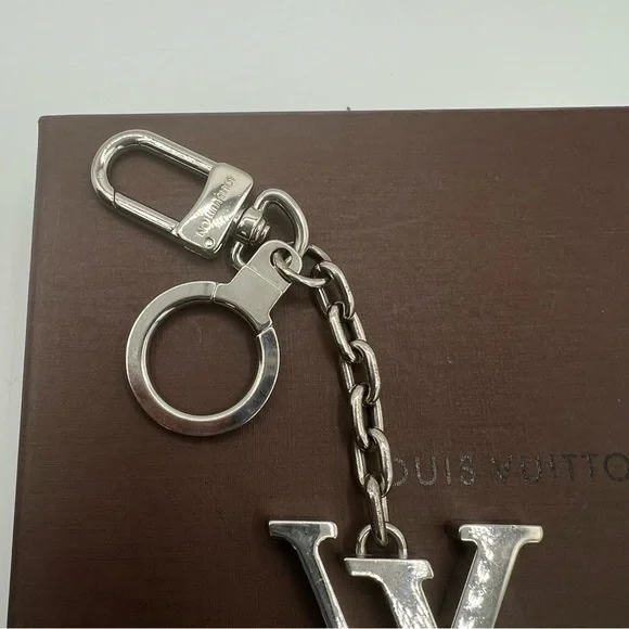 Authentic Louis Vuitton key charm ❤️silver